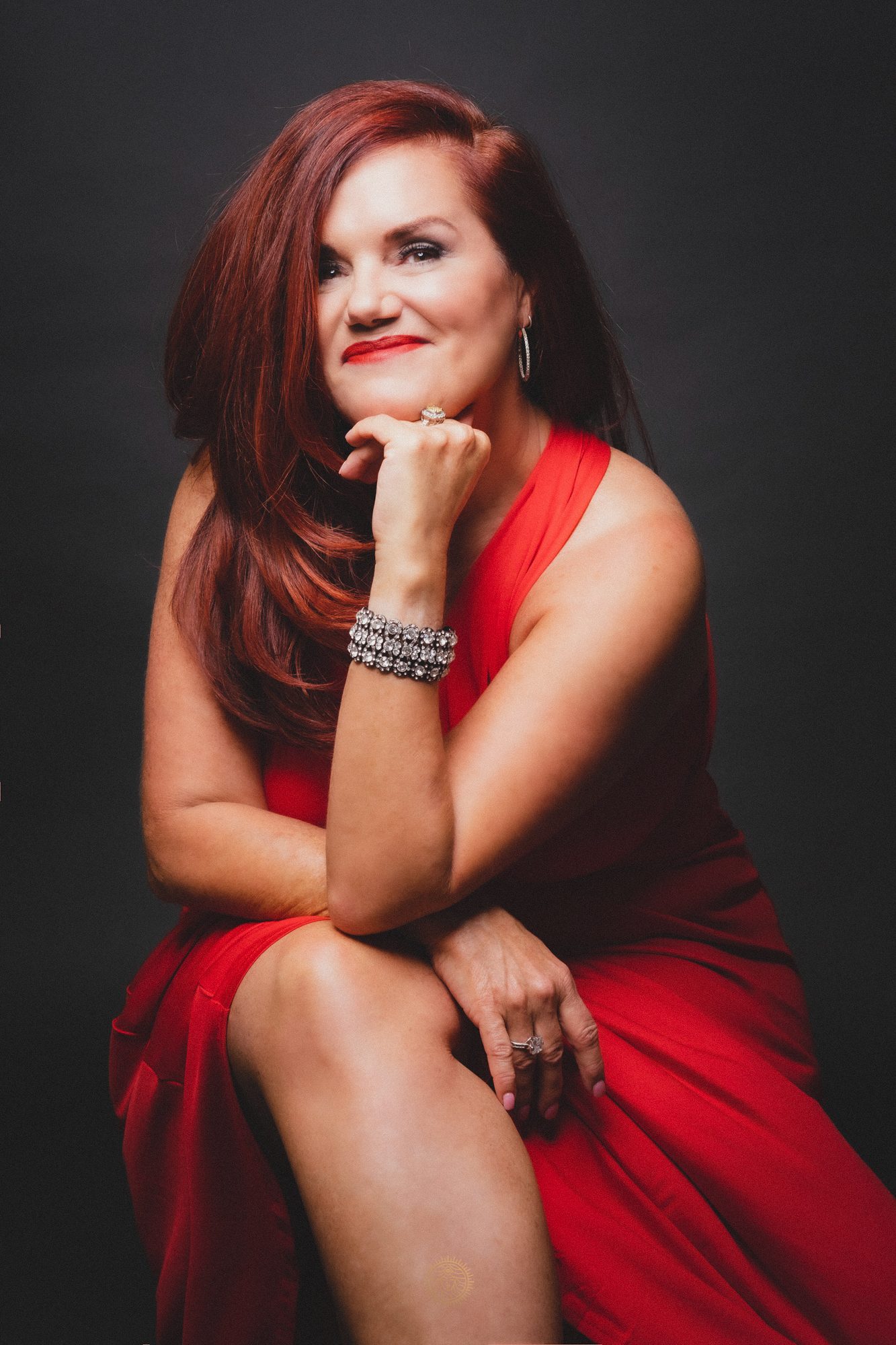 Dr. Lori C. Ebert in a red dress